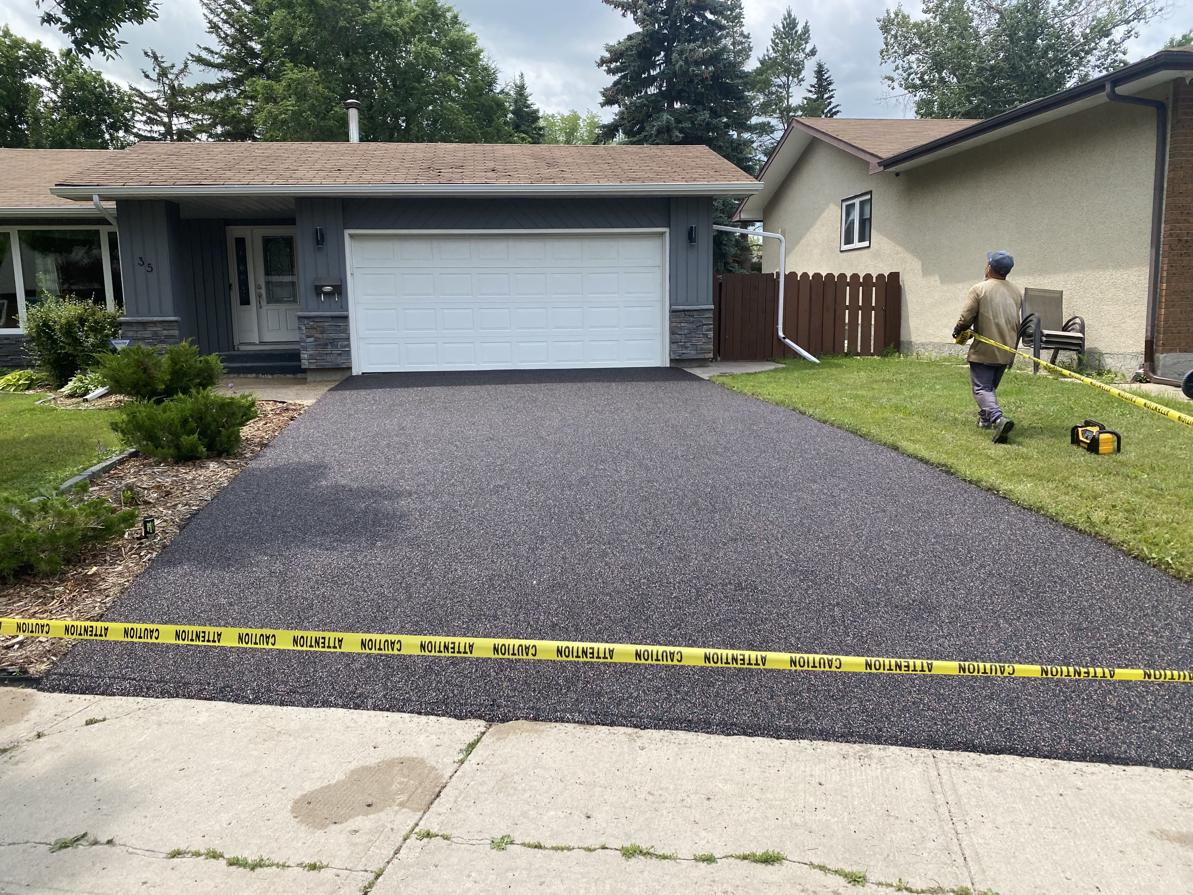 Rubber paving over existing concrete driveway Yorkton Saskatchewan